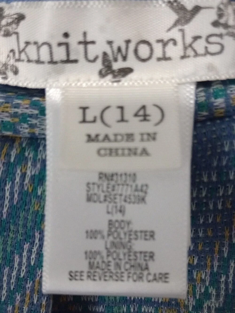 Knitworks sleeveless knit